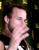 Adam_Cole_watches_his_NXT_debut_at_TakeOver__Brooklyn_III__WWE_Playback_mp40123.jpg
