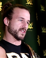 Adam_Cole_watches_his_NXT_debut_at_TakeOver__Brooklyn_III__WWE_Playback_mp40124.jpg