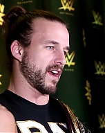Adam_Cole_watches_his_NXT_debut_at_TakeOver__Brooklyn_III__WWE_Playback_mp40125.jpg