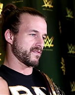 Adam_Cole_watches_his_NXT_debut_at_TakeOver__Brooklyn_III__WWE_Playback_mp40143.jpg