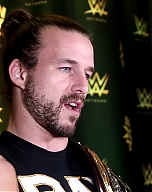 Adam_Cole_watches_his_NXT_debut_at_TakeOver__Brooklyn_III__WWE_Playback_mp40145.jpg