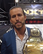 NXT_Champ_Adam_Cole_talks_Undisputed_Era2C_Historic_Moment2C_NXT2C_USA_Network2C_Fans2C_Baszler_at_WWE_PC_mp40636.jpg