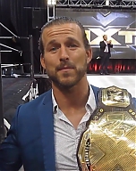 NXT_Champ_Adam_Cole_talks_Undisputed_Era2C_Historic_Moment2C_NXT2C_USA_Network2C_Fans2C_Baszler_at_WWE_PC_mp40684.jpg