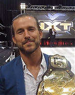 NXT_Champ_Adam_Cole_talks_Undisputed_Era2C_Historic_Moment2C_NXT2C_USA_Network2C_Fans2C_Baszler_at_WWE_PC_mp40698.jpg