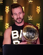 Adam_Cole_watches_his_NXT_debut_at_TakeOver__Brooklyn_III__WWE_Playback_mp40025.jpg