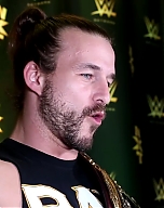 Adam_Cole_watches_his_NXT_debut_at_TakeOver__Brooklyn_III__WWE_Playback_mp40079.jpg