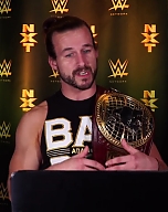 Adam_Cole_watches_his_NXT_debut_at_TakeOver__Brooklyn_III__WWE_Playback_mp40187.jpg